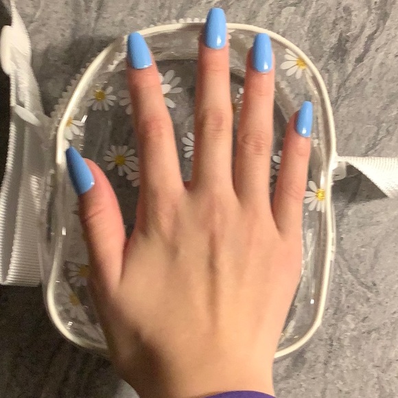 Small, cute bag with daisies on it fits 12 to 9 stuff Great for kids. - Picture 2 of 6